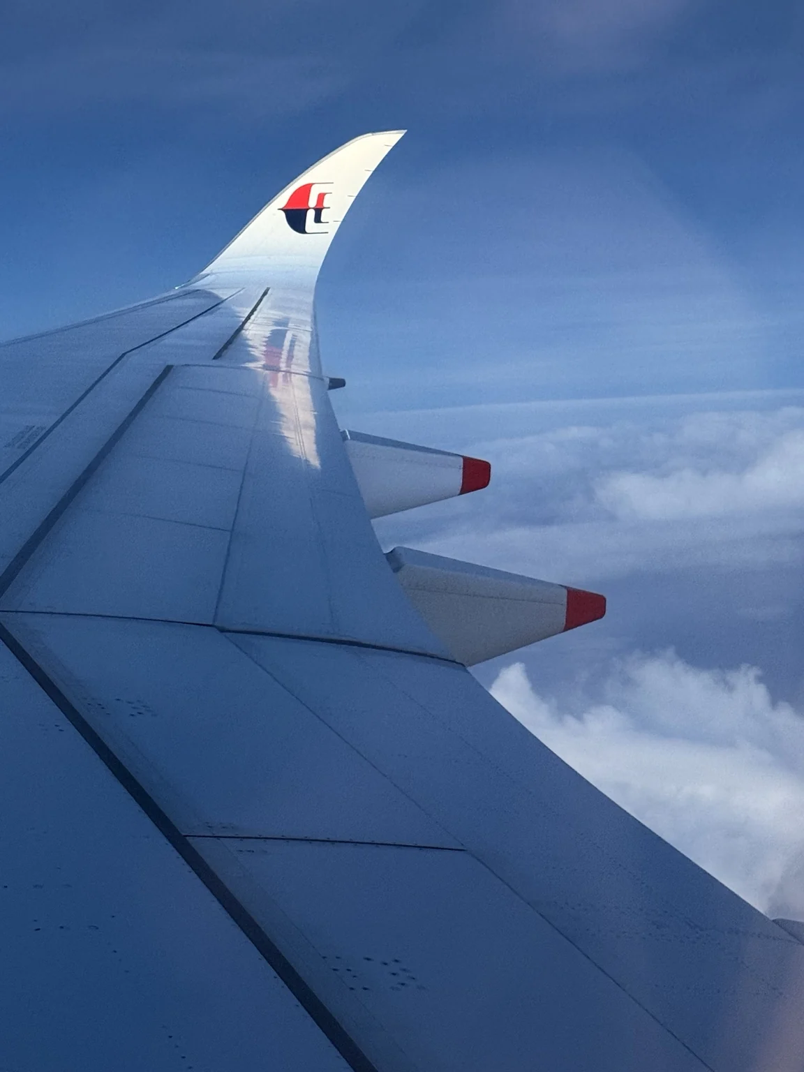 The Malaysia Airlines winglet seen from a window seat.